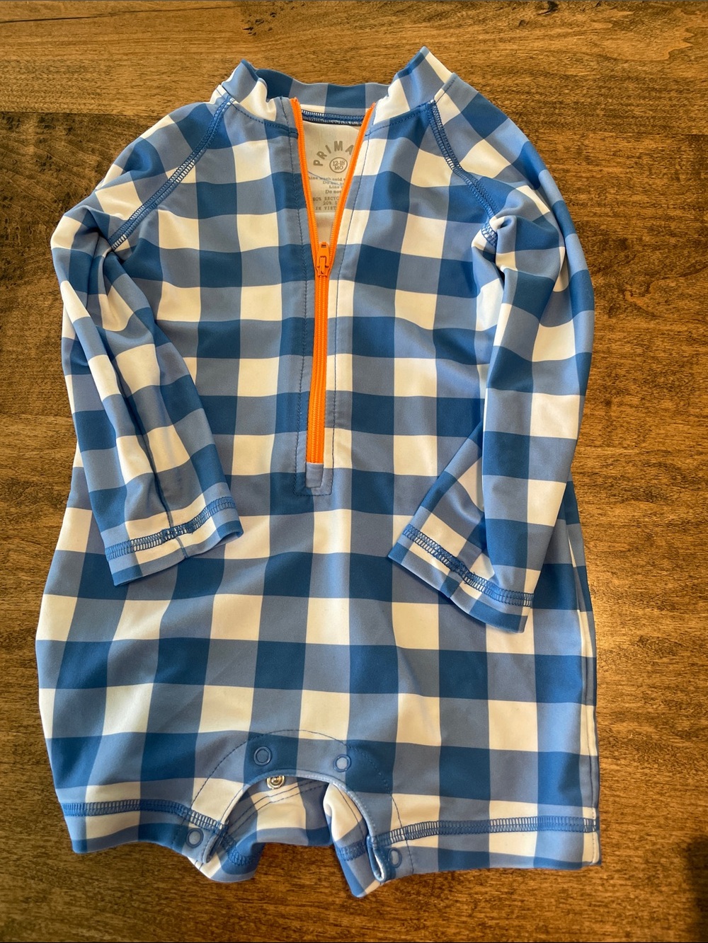 Primary Blue and White Gingham Baby Rashguard with Orange Zipper